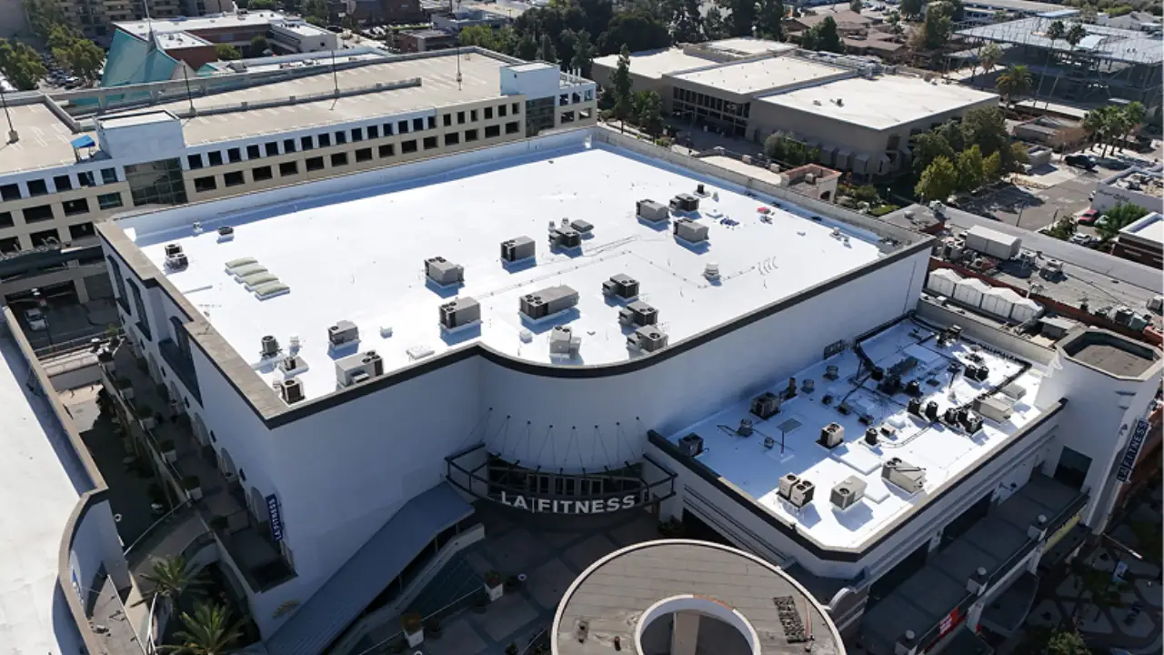 Aerial view of the white flat roof of LA Fitness in Glendale