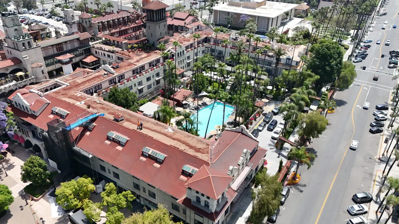 Aerial view of the Mission Inn's red tile roofs in downtown Riverside