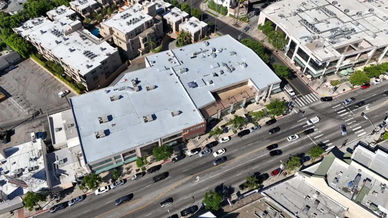 Aerial view of the white flat roof of LA Fitness in Tarzana